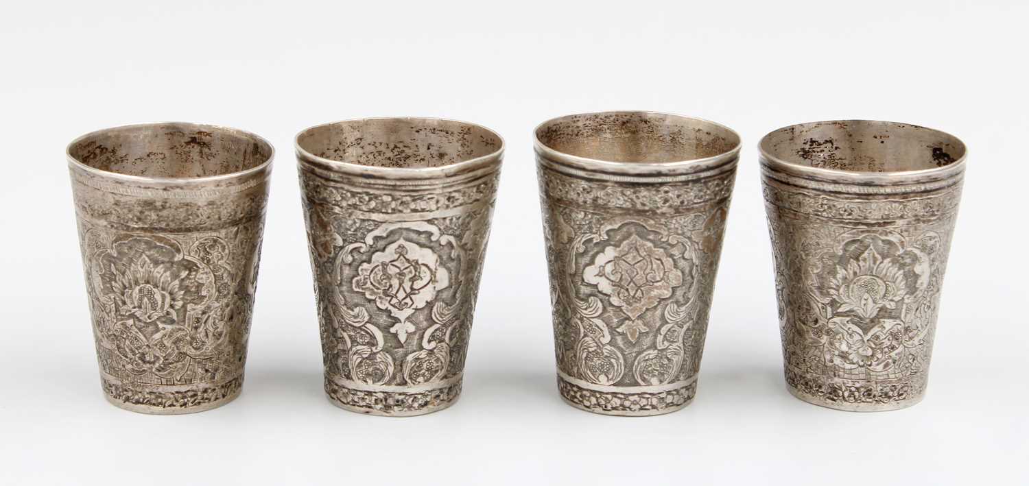 Lot 54 - A Set of Four Persian Silver Beakers, With...