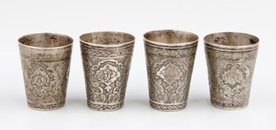 Lot 54 - A Set of Four Persian Silver Beakers, With...