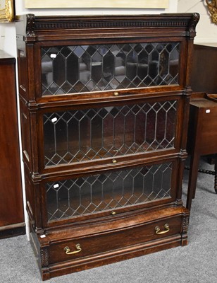 Lot 1295 - A 1920's Globe Wernicke Oak Three-Tier...