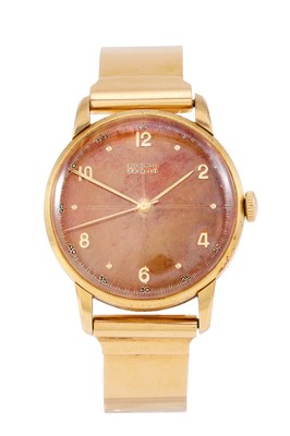 Lot 2418 - Zenith: An 18 Carat Gold Wristwatch, signed...