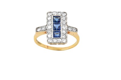 Lot 2042 - A Sapphire and Diamond Cluster Ring three...
