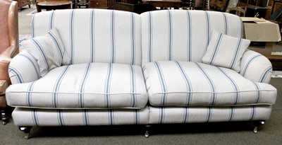 Lot 1424 - A 'Sofas & Stuff' Four Seater Sofa with pale...