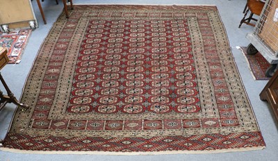 Lot 1105 - Tekke Carpet, the deep madder field with...