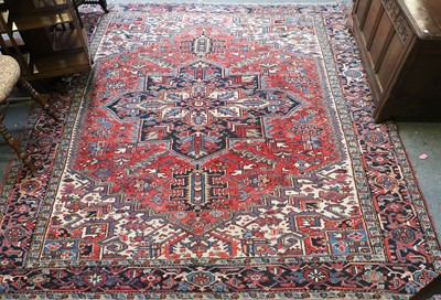 Lot 1177 - Heriz Carpet, the faded strawberry field of...