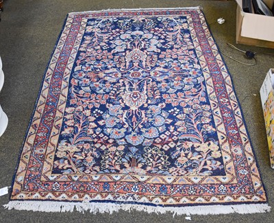 Lot 1259 - West Persian Village Rug, the indigo field of...