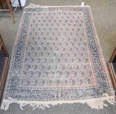 Lot 1260 - Amritsar Rug, the ivory field with columns of...