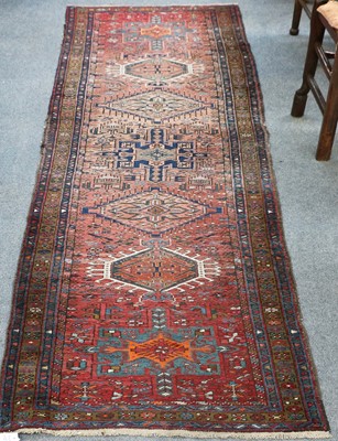 Lot 1103 - A Narrow Heriz Runner, the abrashed faded...