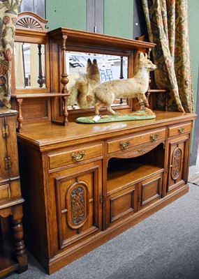 Lot 1284 - A Late Victorian Carved Oak Mirror Back...