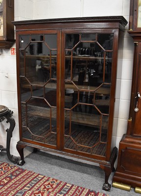 Lot 1287 - A George III Mahogany Bookcase, with two...