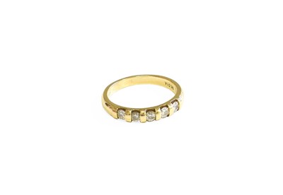 Lot 553 - A 9 Carat Gold Diamond Five Stone Ring, the...