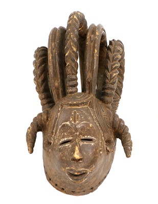 Lot 290 - An Igbo Carved Wood Maiden Mask, Nigeria, the...