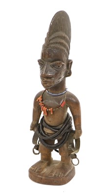 Lot 197 - A Yoruba Carved Wood Ibiji, standing with high...