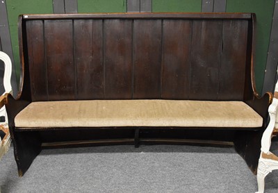 Lot 1199 - A 19th Century Stained Pitch Pine Settle, of...