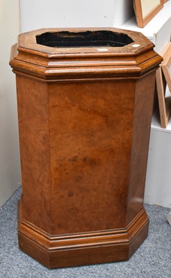 Lot 1309 - An Octagonal Walnut Pedestal, with moulded top...