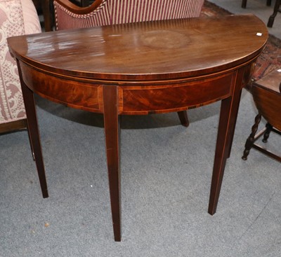 Lot 1457 - A George III Mahogany Demi Lune Foldover Tea...