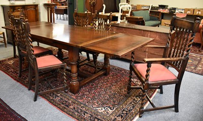 Lot 1359 - A 20th Century Oak Draw Leaf Dining table,...