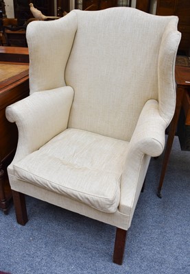 Lot 1306 - A George III Wing Back Armchair, in later...