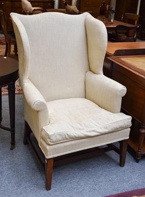 Lot 1308 - A George III Wing Back Armchair, in later...