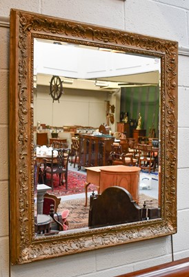 Lot 1215 - A Gilt Framed Mirror, the rectangular bevelled...