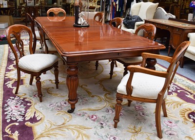 Lot 1340 - A Victorian Mahogany Dining Table, with two...