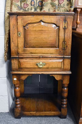 Lot 1282 - A Titchmarsh & Goodwin Oak Cabinet, the...