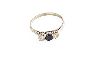 Lot 461 - A Sapphire and Diamond Three Stone Ring, the...