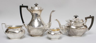 Lot 75 - A Four-Piece George V Silver Tea and...