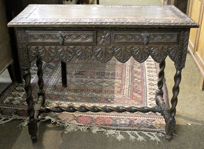 Lot 1498 - A Victorian Heavily Carved Two Drawer Side...