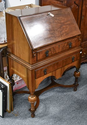 Lot 1171 - A Reproduction Walnut Bureau on Stand, in the...