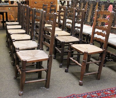 Lot 1443 - Twelve Similar Oak Ladder Back Rush Seated...