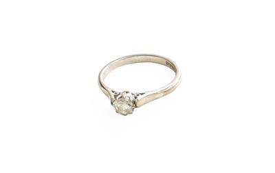 Lot 447 - An 18 Carat White Gold Diamond Solitaire Ring,...