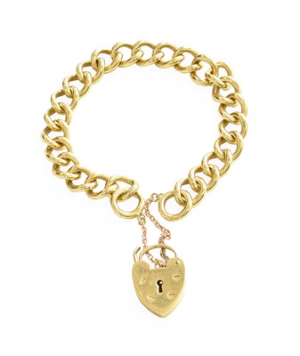 Lot 449 - A 9 Carat Gold Curb Link Bracelet, with a 9...