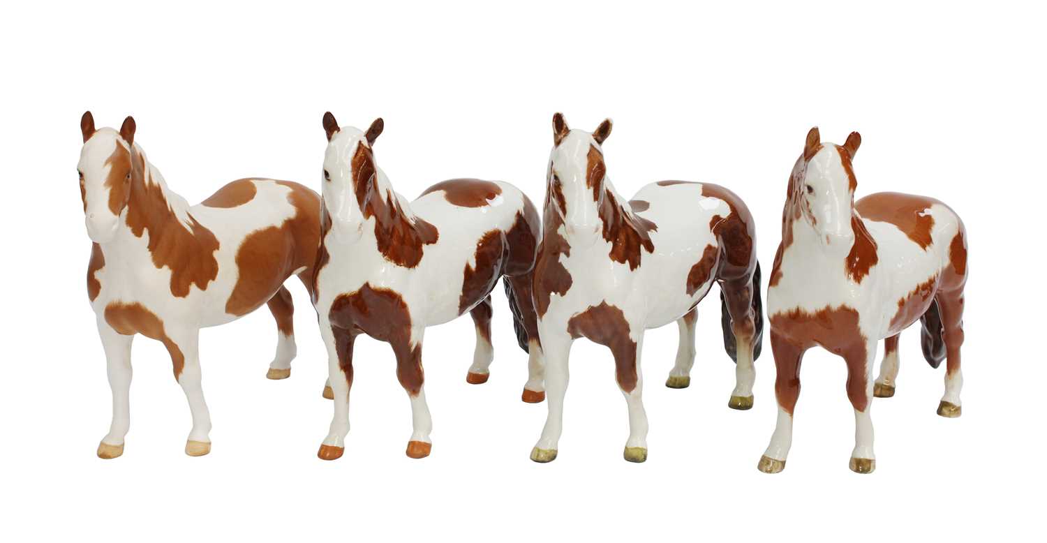 Lot 2182 - Beswick Pinto Ponies, model No. 1373, three