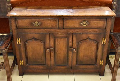 Lot 1529 - A Reproduction Oak Side Cabinet, in Titchmarsh...