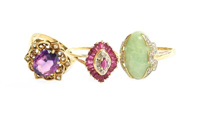 Lot 594 - A 9 Carat Gold Jade and Diamond Cluster Ring,...