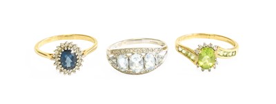 Lot 555 - A 9 Carat Gold Aquamarine and Diamond Ring,...