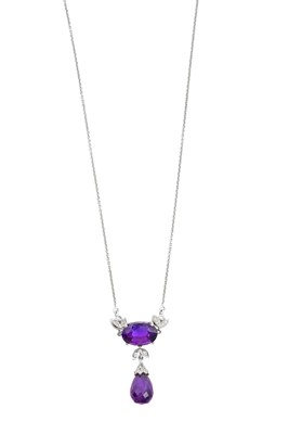 Lot 2046 - An Amethyst and Diamond Necklace the oval cut...