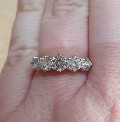 Lot 2038 - An 18 Carat Gold Diamond Five Stone Ring the...