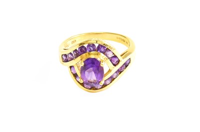 Lot 569 - An 18 Carat Gold Amethyst Ring, the oval cut...