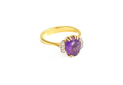 Lot 585 - An 18 Carat Gold Amethyst and Diamond Ring,...