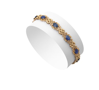 Lot 2149 - A 9 Carat Gold Sapphire Bracelet ten oval cut...