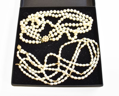 Lot 581 - A Triple Row Cultured Pearl Choker, with a 9...