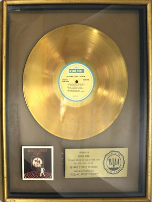 Lot 4197 - Bee Gees - Gold Disc Presented To Robin Gibb