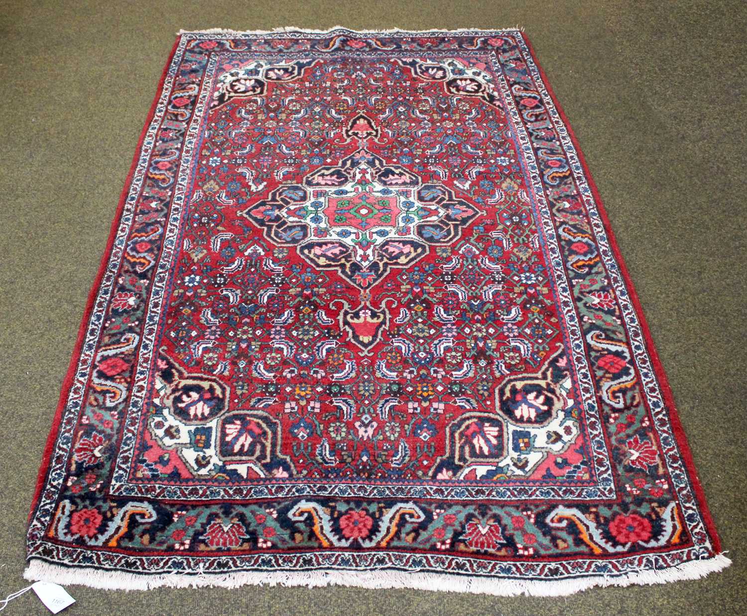 Lot 1167 - Bidjar Rug, the deep burgundy field of