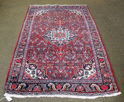 Lot 1167 - Bidjar Rug, the deep burgundy field of Herati...