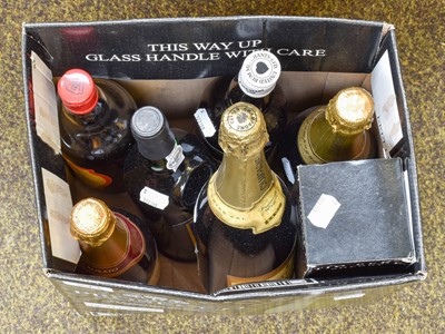 Lot 243 - 7 bottles of Champagne and Spirits This lot is...