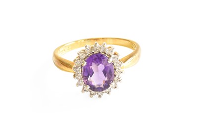 Lot 524 - An 18 Carat Gold Amethyst and Diamond Cluster...