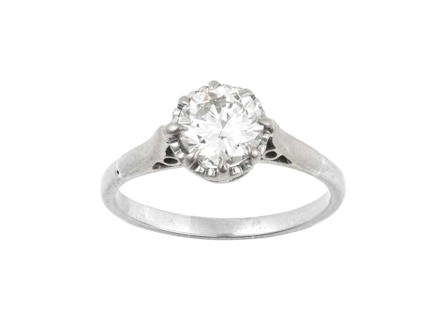 Lot 2003 - A Diamond Solitaire Ring the round brilliant...
