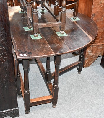 Lot 1427 - An 18th Century Oak Gateleg Table, 132cm by...