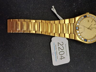 Lot 2204 - IWC: An 18 Carat Gold Sapphire and Diamond Set...